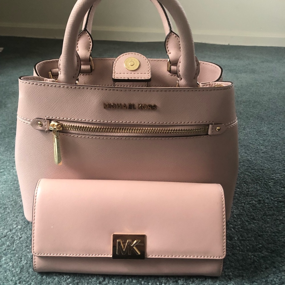 Michael Kors purse and matching wallet.